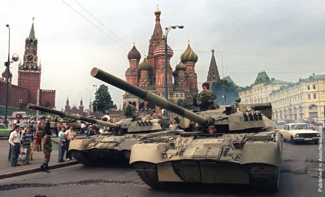 Soviet Army tanks parked near Spassky Gate, an entrance to the Kremlin and Basils Cathedral in Moscows Red Square after a coup toppled Soviet President Mikhail Gorbachev on August 19, 1991. Tanks rolled through Moscow towards the Russian White House, where Boris Yeltsin, leader of the Soviet-era Russian republic at the time, gathered his supporters after denouncing the coup