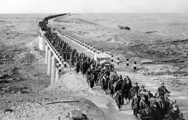 Bardia, a fortified Libyan seaport, was captured by British forces, with more than 38,000 Italian prisoners, including four generals, and vast quantities of war material. An endless stream of Italian prisoners leaves Bardia, on February 5, 1941, after the Australians had taken possession