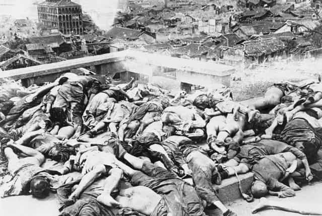 Bodies of dead Chongqing citizens lie in piles after some 700 people were reportedly killed by a Japanese bombing raid on China in July of 1941. Between 1939 and 1942, more than three thousand tons of bombs were dropped by Japanese aircraft over Chongqing, resulting in well over 10,000 civilian casualties
