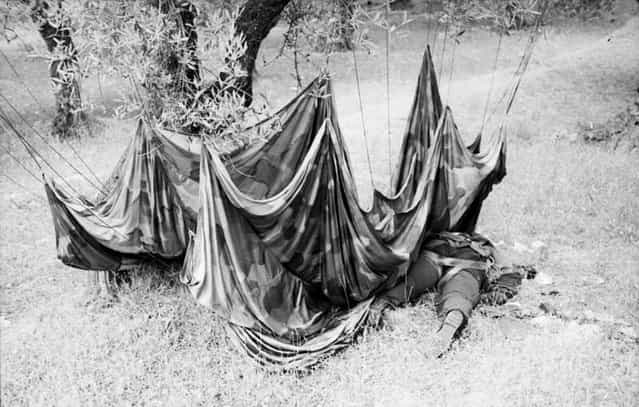 A fallen paratrooper and his parachute, on the island of Crete, in early 1941