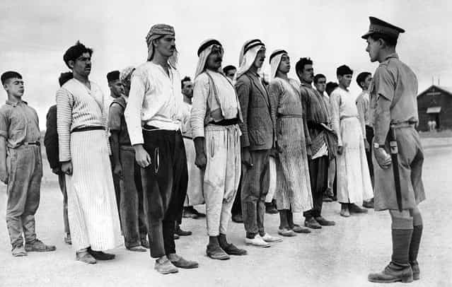 These Arab recruits line up in a barracks square in the British Mandate of Palestine, on December 28, 1940, for their first drill under a British solider. Some 6,000 Palestinian Arabs signed up with the British Army during the course of World War II