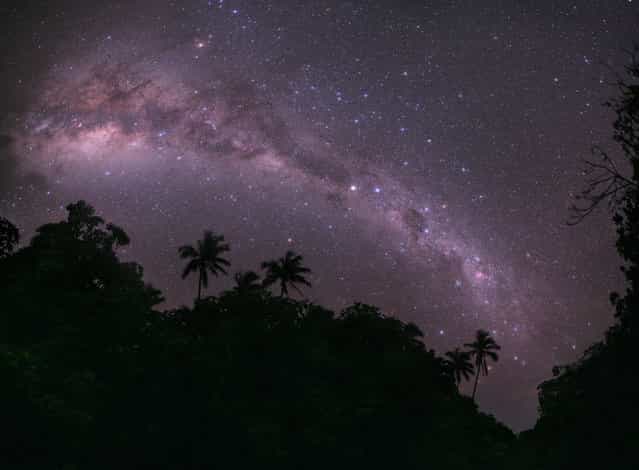 Milky Way over the island of the archipelago Cook
