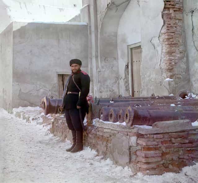 Photos by Sergey Prokudin-Gorsky. Sentry at the palace, and old cannons. Russia, Bukhara, 1911