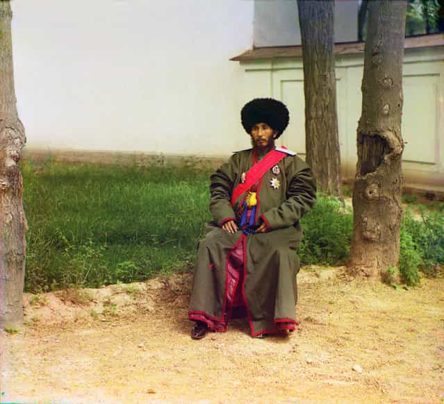 Photos by Sergey Prokudin-Gorsky. His Highness Isfandiyar, Khan of the Russian protectorate of Khorezm (Khiva), full-length portrait, seated outdoors, 1911