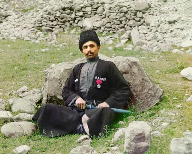 Photos by Sergey Prokudin-Gorsky. Dagestani types. Sunni Muslim man wearing traditional dress and headgear, with a sheathed dagger at his side. Russia, Dagestan region, Avar District, Arakan, 1904