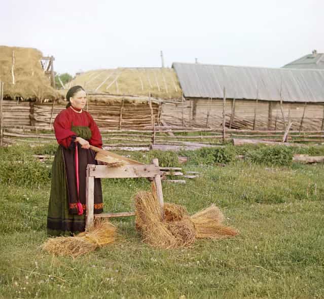 Photos by Sergey Prokudin-Gorsky. Peasant woman breaking flax. Russia, Perm Province, Place unknown, circa 1907