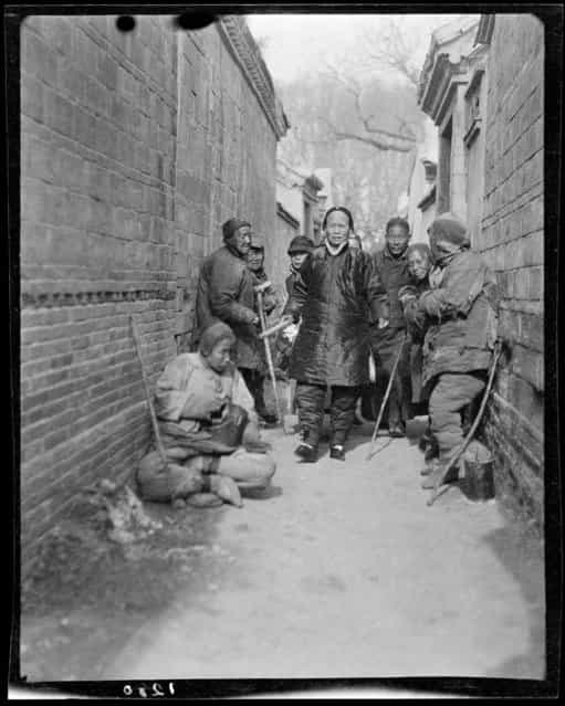 Road to Temple Beggars. China, Baoding Fu, 1917-1919. (Photo by Sidney David Gamble)