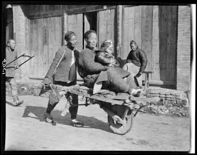 Man on Wheelbarrow. China, Kaifeng Xian, 1917-1919. (Photo by Sidney David Gamble)
