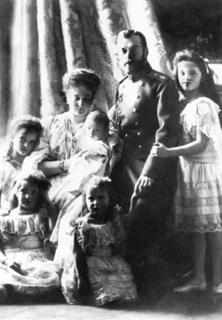 Tsar Nicholas II of Russia (1868–1918), with his wife, Alexandra Feodorovna (1872–1918), and their five children. Empress Alexandra holds the baby Tsarevich Alexis (1904–1918), surrounded by the Grand Duchesses Olga, Tatiana, Marie and Anastasia, circa 1905. All perished at Ekaterinberg in July 1918.