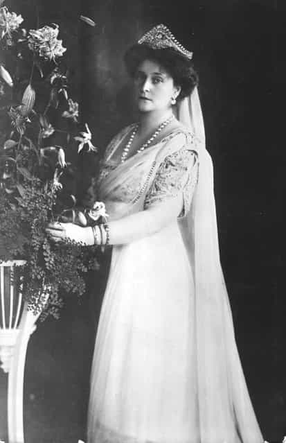 Alexandra (Alix) Feodorovna (1872–1918), German Princess and Empress of Russia as the wife of Tsar Nicholas II, whom she married in 1894. When the revolution broke out, she was imprisoned with the rest of the royal family in 1917, and later shot at Ekaterinberg. Circa 1912.