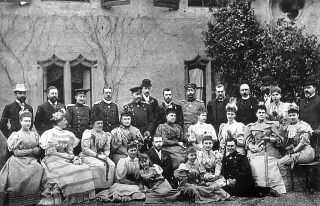 Members of several European Royal families outside Rosenau Castle during celebrations for the betrothal of Tsarevich Nicholas of Russia (soon to be Tsar Nicholas II) and Princess Alix of Hesse (back row left to right); Prince Henry of Battenberg, Prince Philip of Coburg, Prince Ferdinand of Romania (later King Ferdinand), Prince Henry of Prussia, Grand Duke Paul of Russia, The Duke of Coburg, Tsarevich Nicholas of Russia, William II of Germany and Prussia, Grand Duke Vladimir, Duke of Connaught, Prince Louis of Battenberg, Alexendra of Coburg and The Prince of Wales (later King Edward VII). Original Artwork: Photo by J Russell & Sons, 1894.