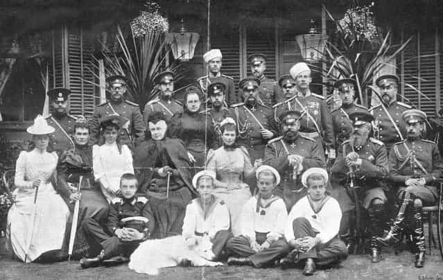 Tsar Alexander III of Russia (1845–1984) and his family in Neuilly-sur-Seine, circa 1890. From left to right, (back row), Sergei Mikhailovich and Nikolai Nicolaievich; (third row) two Dukes of Mecklenburg-Strelitz, Constantin Constantinovich, Queen Olga of Greece, the future Tsar Nicholas II, Vladimir Alexandrovich (the Tsar's brother), Prince Alexander Petrovich von Oldenburg, Dmitri Constantinovich, Peter Alexandrovich von Oldenburg, Georg Maximilianovich von Leuchtenberg; (second row), Grand Duchess Xenia Alexandrovna (the Tsar's daughter), Marie Paulovna (the Tsar's sister-in-law), Grand Duchess Elena Vladimirovna, Alexandra Iosifovna (the Tsar's aunt), Princess Maria Feodorovna (the Tsar's consort), Tsar Alexander III, Mikhail Nikolaievich, Pavel Alexandrovich; (front row), Alexei Mikhailovich, Grand Duke Mikhail Alexandrovich (the Tsar's son), Andrei and Boris Vladimirovich (the Tsar's nephews). Photograph by the de Jongh Brothers. (Photo by Otto Herschan)