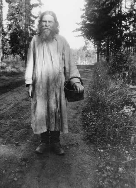 Russian Orthodox monk with a birchbark basket, Valamo Monastery, Karelia, Russia (then Finland), 1930s. (Photo by Einar Erici)