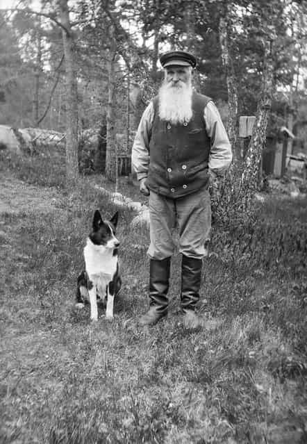 Carl Persson, Betsede, Uppland, Sweden, 1929. The farmer Carl Persson, 69 years old, with a dog. (Photo by Einar Erici)