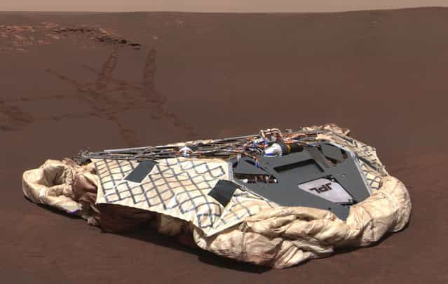 This image taken by the panoramic camera onboard Opportunity shows the rover's now-empty lander, the Challenger Memorial Station, at Meridiani Planum, Mars, on February 27, 2004. (Photo by NASA/JPL/Cornell/The Atlantic)