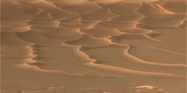 Martian sand dunes seen by Opportunity on Friday, August 6, 2004. The dunes in the foreground are approximately 3 feet (1 meter) high. (Photo by AP Photo/NASA/JPL/Cornell/The Atlantic)