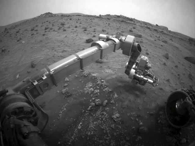 Opportunity's twin rover, Spirit, on its 1,277th sol. Spirit became stuck in soft soil in late 2009, and its last communication with Earth was sent on March 22, 2010. (Photo by AP Photo/NASA/The Atlantic)