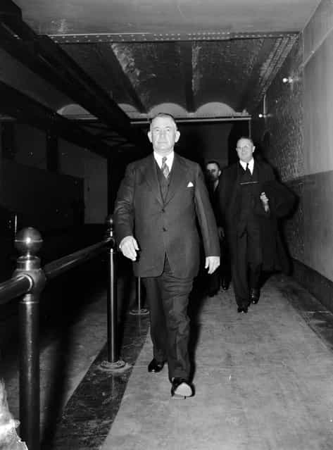 [Senate Majority Leader takes a walk. Washington, D.C., Nov. 15. Senate Majority Leader Alvin W. Barkley prefers to walk thru the Senate subway instead of using the tram car on his way to the opening of the special session on November 15, 1937]. (Photo by Harris & Ewing Collection)