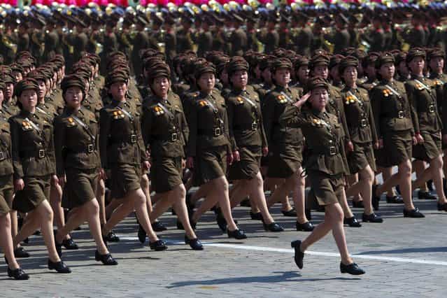 North Korean soldiers march during a mass military parade in Pyongyang's Kim Il Sung Square, on Sunday, April 15, 2012. (Photo by David Guttenfelder/AP Photo)
