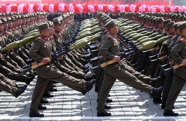 Soldiers march past the podium during a military parade to celebrate the centenary of the birth of Kim Il Sung in Pyongyang, on April 15, 2012. (Photo by Reuters/Stringer)
