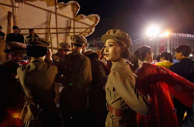 A dancer dressed as a soldier takes part in a gala show in Pyongyang, on April 16, 2012. (Photo by Bobby Yip/Reuters)