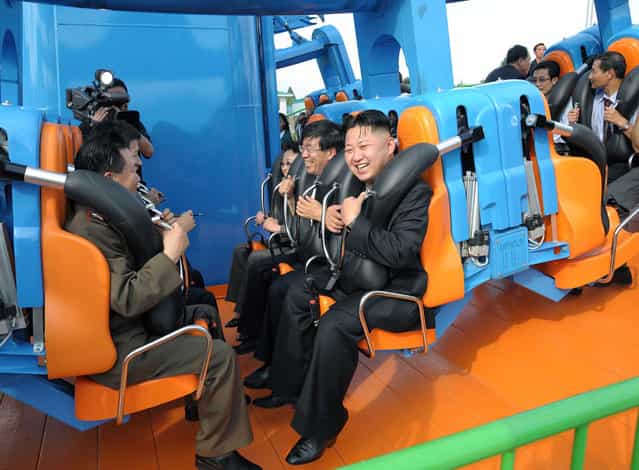 North Korean leader Kim Jong-Un prepares to take a ride with other high-level officials during the opening ceremony of the Rungna People's Pleasure Ground along the Taedong River in Pyongyang, on July 25, 2012. (Photo by Reuters/KCNA)