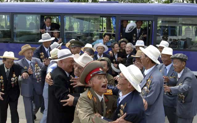 North Korean war veterans arrive to attend celebrations of [War Victory Day], which falls on July 27, of the 1950-53 Korean War in Pyongyang, on July 26, 2012. (Photo by Reuters/KCNA)
