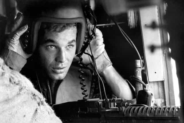 Lance Cpl. James C. Farley, helicopter crew chief, Vietnam, 1965. (Photo by Larry Burrows/Time & Life Pictures)