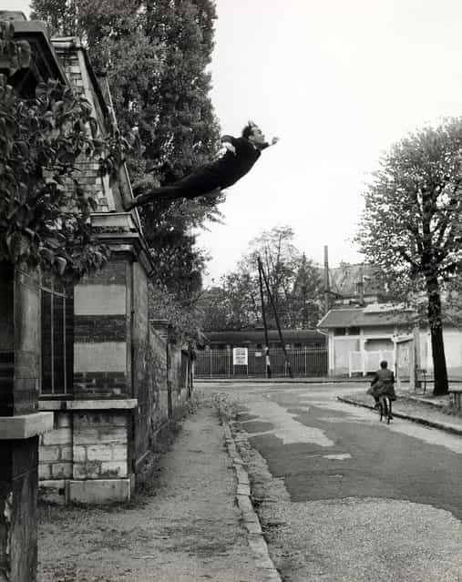 [Leap into the Void] by Yves Klein, 1960. As in his carefully choreographed paintings in which he used nude female models dipped in blue paint as paintbrushes, Klein's photomontage paradoxically creates the impression of freedom and abandon through a highly contrived process. In October 1960, Klein hired the photographers Harry Shunk and Jean Kender to make a series of pictures re-creating a jump from a second-floor window that the artist claimed to have executed earlier in the year. This second leap was made from a rooftop in the Paris suburb of Fontenay-aux-Roses. On the street below, a group of the artist’s friends from held a tarpaulin to catch him as he fell. Two negatives – one showing Klein leaping, the other the surrounding scene (without the tarp) – were then printed together to create a seamless [documentary] photograph. To complete the illusion that he was capable of flight, Klein distributed a fake broadsheet at Parisian newsstands commemorating the event. It was in this mass-produced form that the artist's seminal gesture was communicated to the public and also notably to the Vienna Actionists. (Photo courtesy of The Metropolitan Museum of Art)