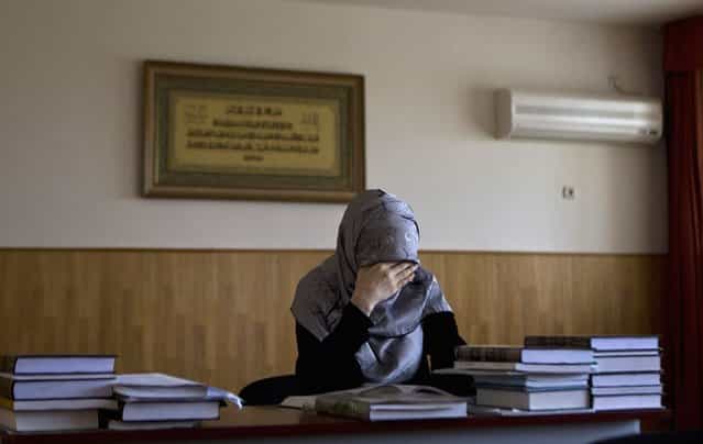 A student attends a lesson in Sharia law at the Russian Islamic University in the Chechen capital Grozny April 23, 2013. (Photo by Maxim Shemetov/Reuters)