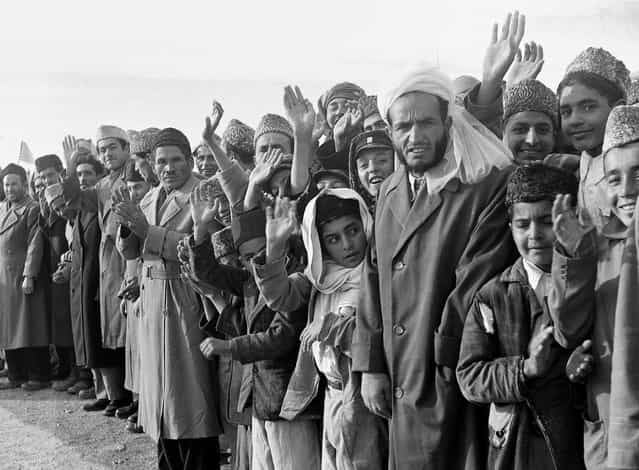 Residents of Afghanistan line the route of U.S. President Dwight Eisenhower's tour in Kabul, Afghanistan, on December 9, 1959. (Photo by AP Photo via The Atlantic)