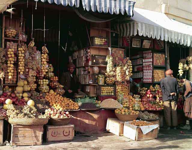 A shopfront display of fruits and nuts in Kabul, in November of 1961. (Photo by Henry S. Bradsher/AP Photo via The Atlantic)