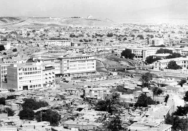 A panoramic view showing the old and new buildings in Kabul, in August of 1969. The Kabul River flows through the city, center right. In the background on the hilltop is the mausoleum of late King Mohammad Nadir Shah. (Photo by AP Photo via The Atlantic)