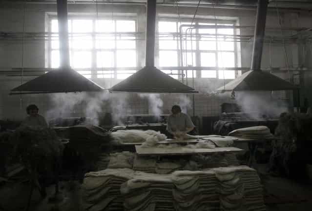 "Valenki. Belarusian workers works at a felt boot factory in Smilovichi, some 35km from Minsk, Belarus