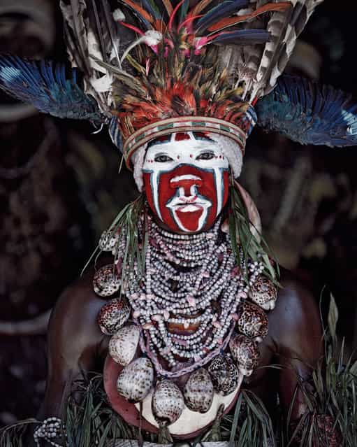 [Goroka] (capital of the Eastern Highlands Province of Papua New Guinea). The indigenous population of the world’s second largest island is one of the most heterogeneous in the world. The harsh terrain and historic inter-tribal warfare has lead to village isolation and the proliferation of distinct languages. A number of different tribes are scattered across the highland plateau. (Jimmy Nelson)