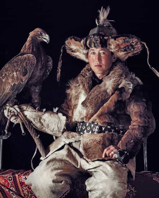The ancient art of eagle hunting is one of many traditions and skills that the Kazakhs have, in recent decades, been able to hold on to. They rely on their clan and herds, believing in pre-Islamic cults of the sky, the ancestors, fire and the supernatural forces of good and evil spirits. (Jimmy Nelson)