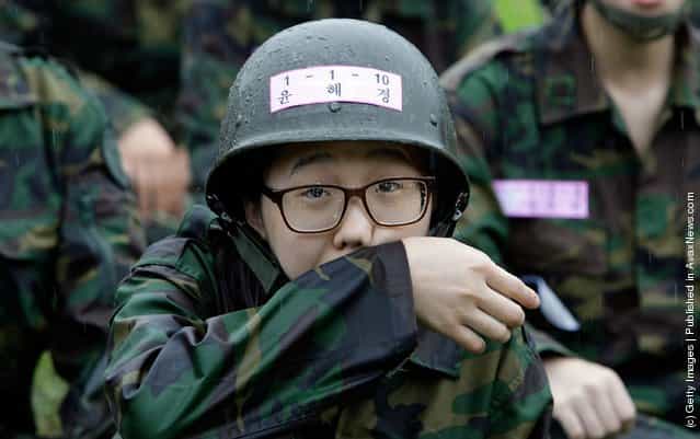 South Korean teenagers participate in a warfare exercise as part of the Special Warfare Commands training course at a military base