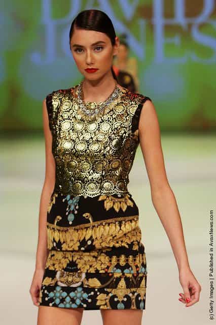 A model showcases designs by Romance Was Born on the catwalk at the David Jones Spring/Summer 2011