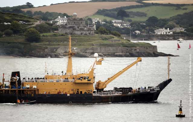 A ship being used for the filming of World War Z sets sail from Falmouth Harbour
