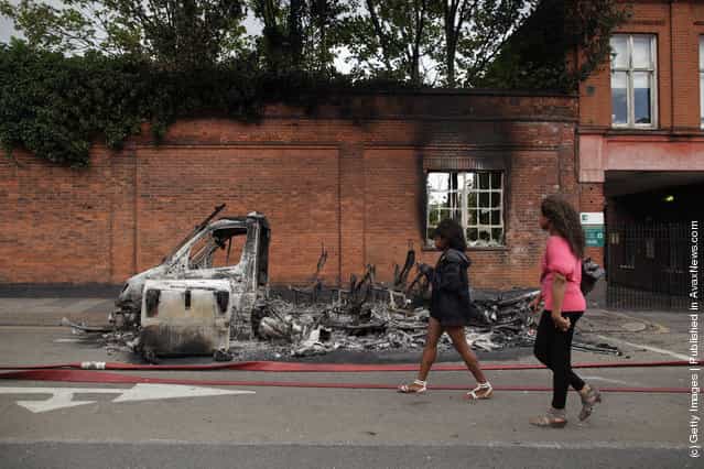 A burnt out van after riots on Tottenham High Road