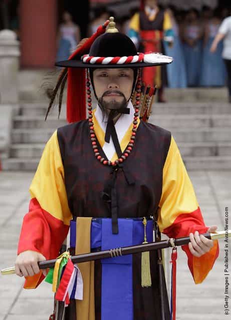 A South Korean man wear traditional costume attend during the 66th Independence Day ceremony in Seoul, South Korea