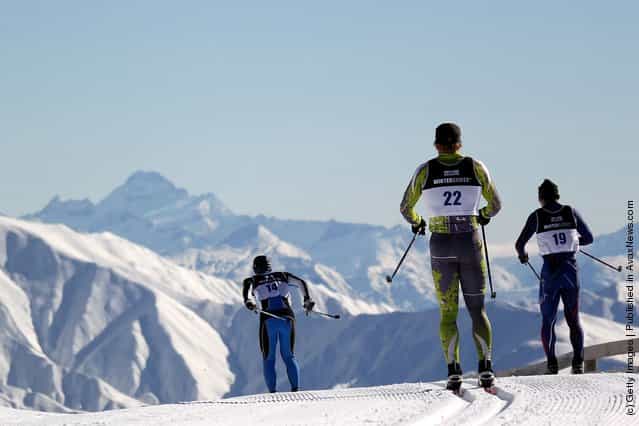 Skiers compete in the Cross Country Mens 10km Mass Start during day one of the Winter Games NZ at Snow Farm