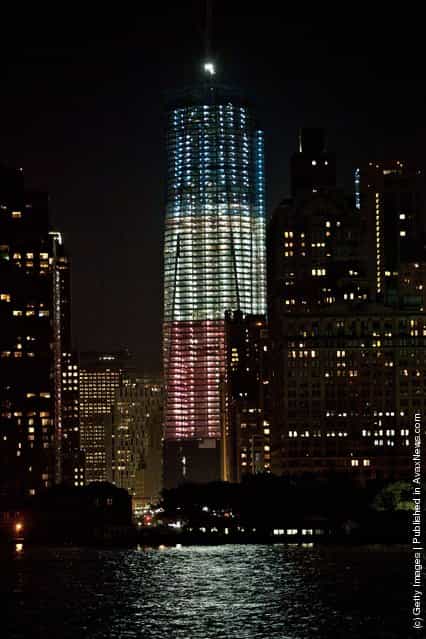 One World Trade, lit red, white and blue, is seen at night on September 9, 2011 in New York City