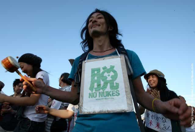Anti-nuclear activists demonstrate during a Say to Goodbye to Nuclear Energy protest in Kobe, Japan