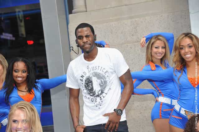 Singer Jason Derulo performs during his Flash Mob with Knicks City Dancers outside of Madison Square Garden