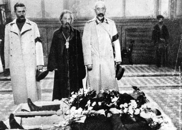 Church and armed forces officials pay their respects as bodies of the Potemkins assassinated officers lie in state. The mutiny aboard the battleship Potemkin sparked the uprising of 1905