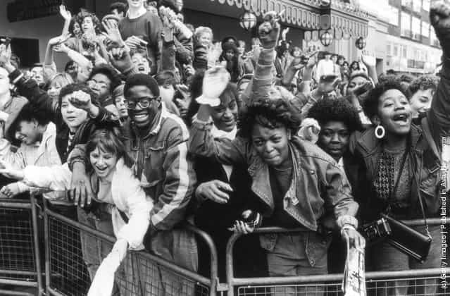 Excited fans of American pop singer Michael Jackson await his arrival, 1985