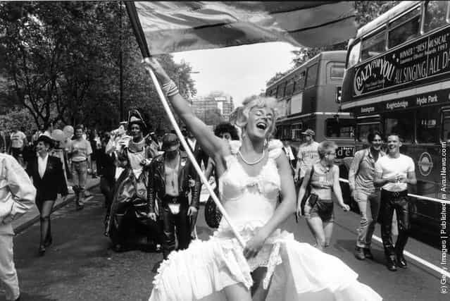 A marcher dressed as Marilyn Monroe during the annual Gay Pride march in London, July 1994