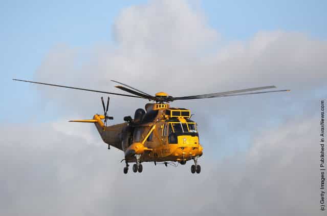 A Royal Air Force search and rescue helicopter leaves RAF Valley as the search continues for the crew of cargo vessel The Swanland which sank off north Wales on November 27, 2011 in Anglesey, Wales