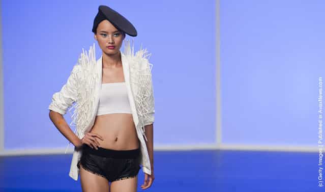 A model showcases designs by Chewthecud on the catwalk during day one of Hong Kong Fashion Week